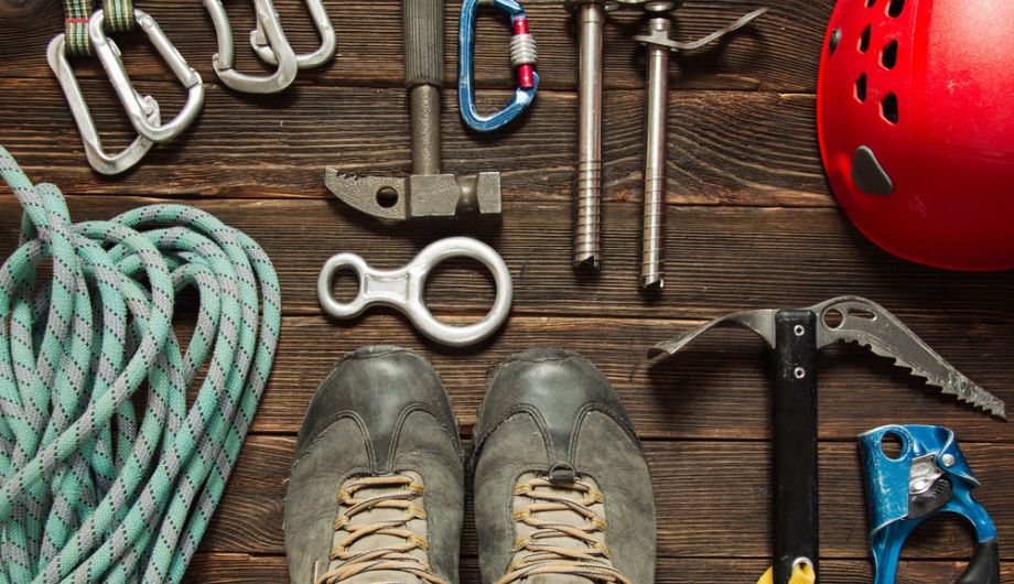 climbing equipment blue rope red helmet hammer trekking shoes